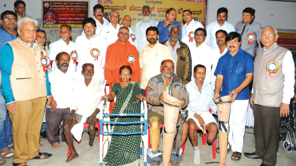 Ramdas exhorts specially abled to live a determined life
