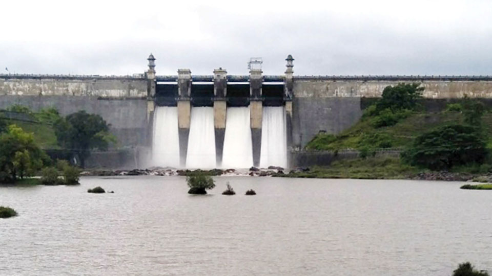 Harangi Dam full, four crest gates open