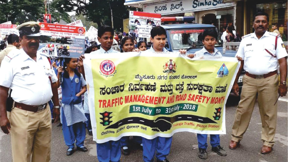 Students join Police, take out awareness rally on traffic rules