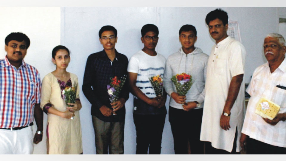 NEET and CET toppers felicitated in city