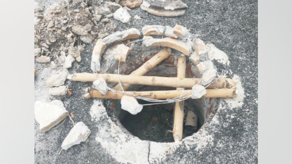 Broken manhole cover posing danger at Hootagalli