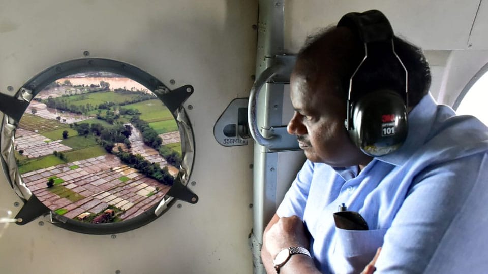 CM H.D. Kumaraswamy surveys Kodagu by air