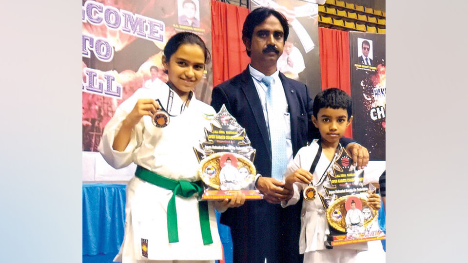 Siblings win prizes in Karate Championship