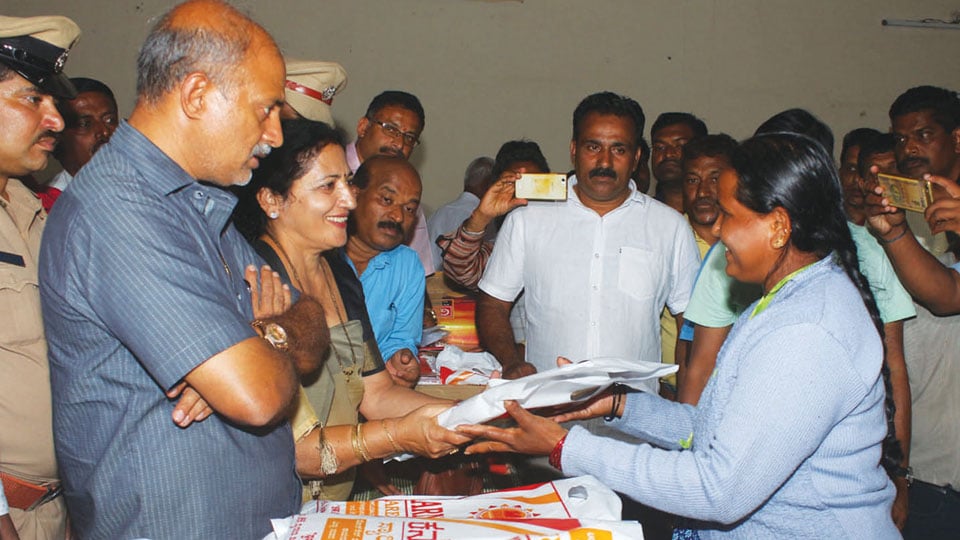 District Minister brightens mood of flood victims on Gowri Fest