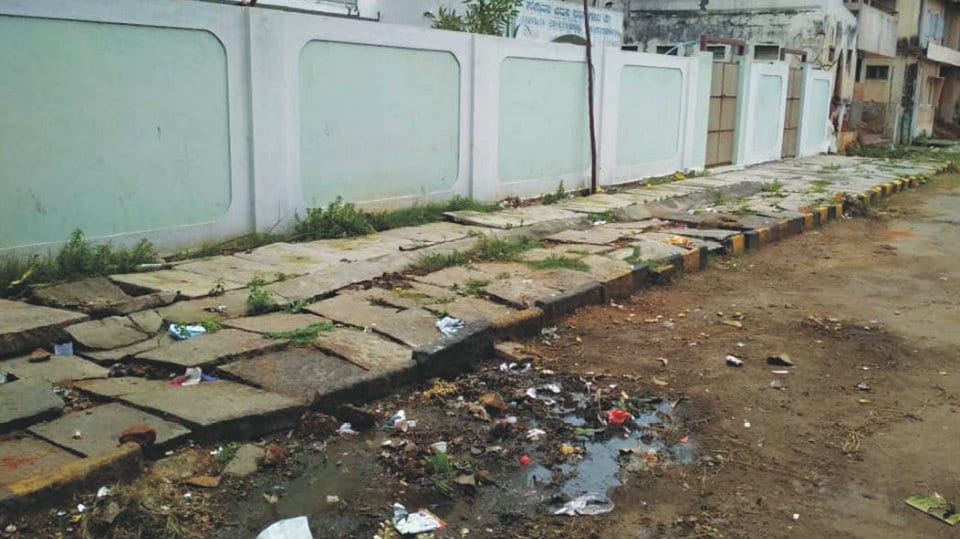 Plea to repair footpath near Sadvidya College