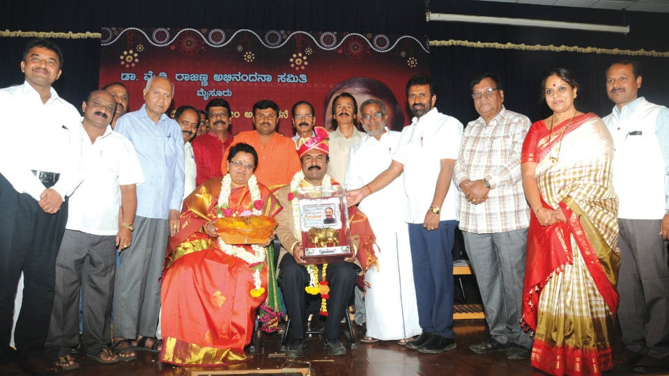 District Kannada Sahitya Parishat  President feted