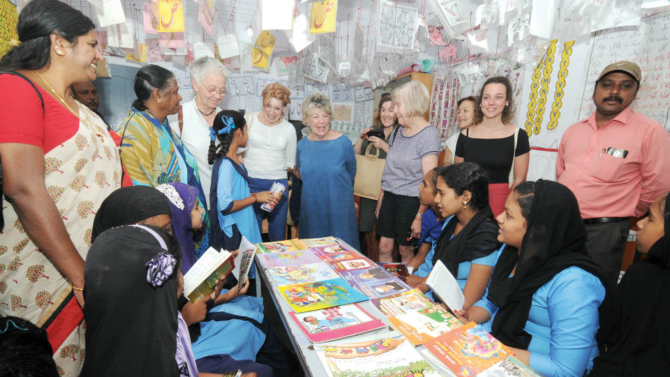 ‘Knit For Peace’ team from England visits Urdu Primary School