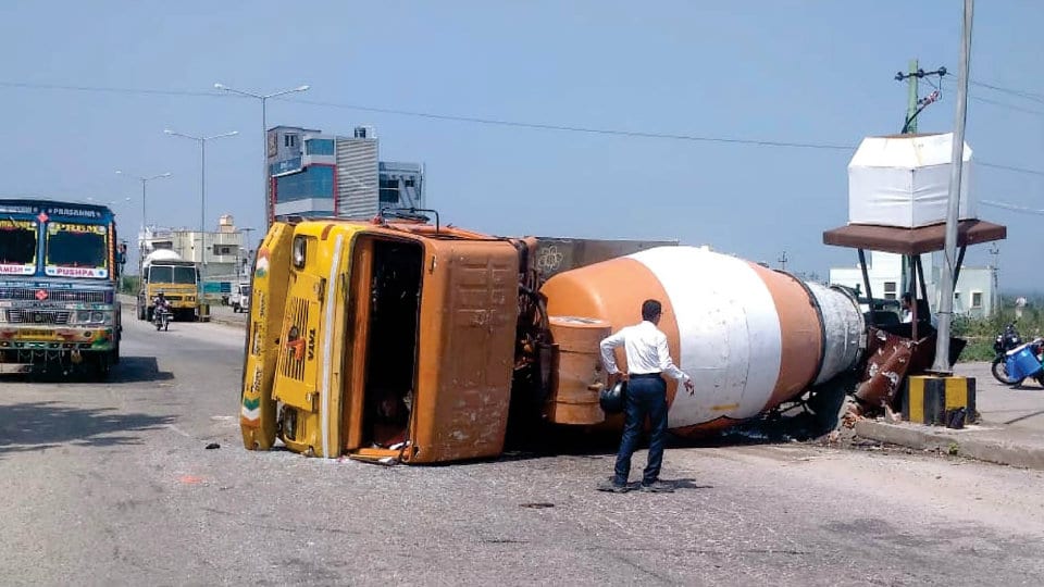 Truck topples on Ring Road, driver critical