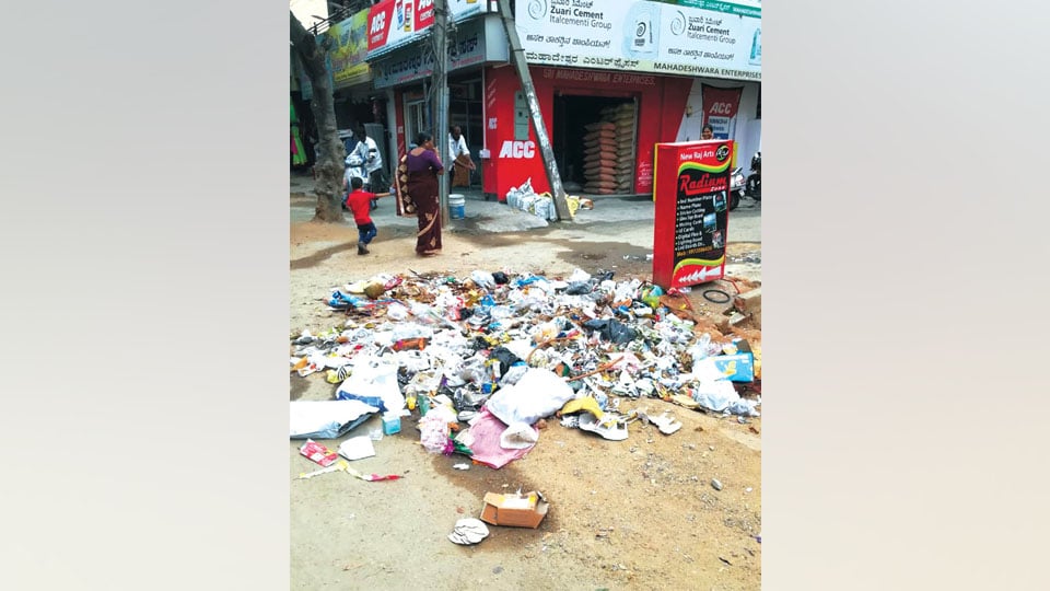 Garbage dumped on Hebbal Main Road needs to be cleared