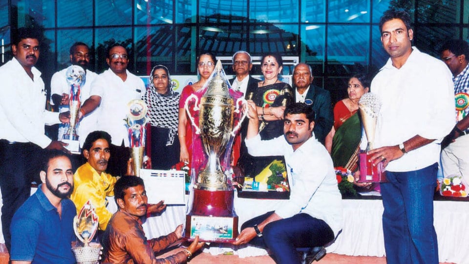 Prize winners at Dasara Flower Show Contest: J.K. Tyres and Industries Ltd.