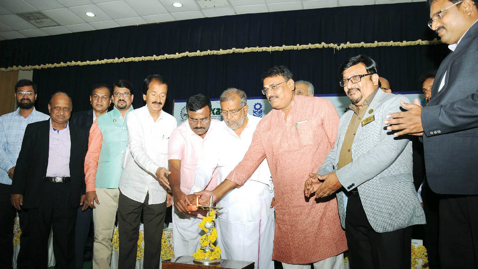 Minister Srinivas goes hammer and tongs at officials
