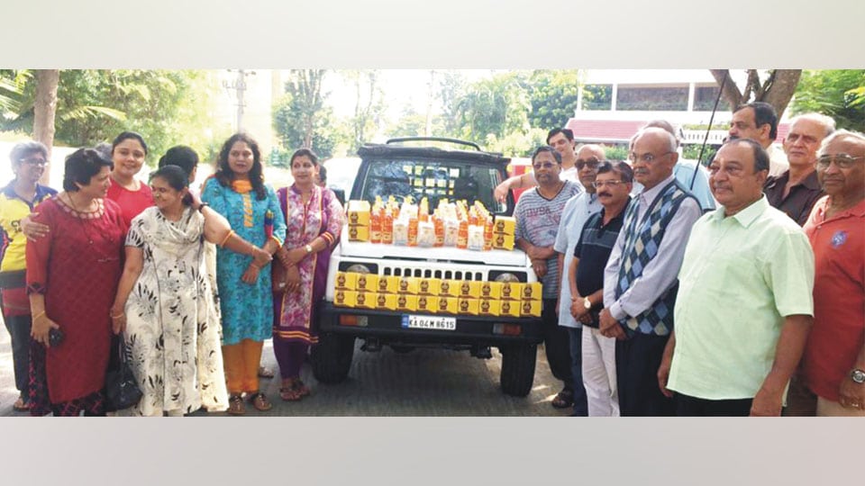 Yadavagiri Residents Welfare Association distributes oil, sweets, sugar to Pourakarmikas