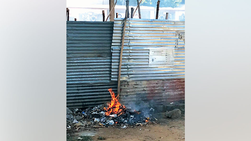 Burning of garbage, a nuisance in N.R. Mohalla