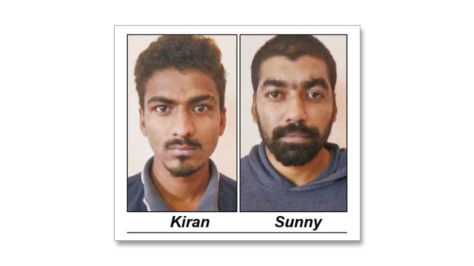 Two held for snatching bag