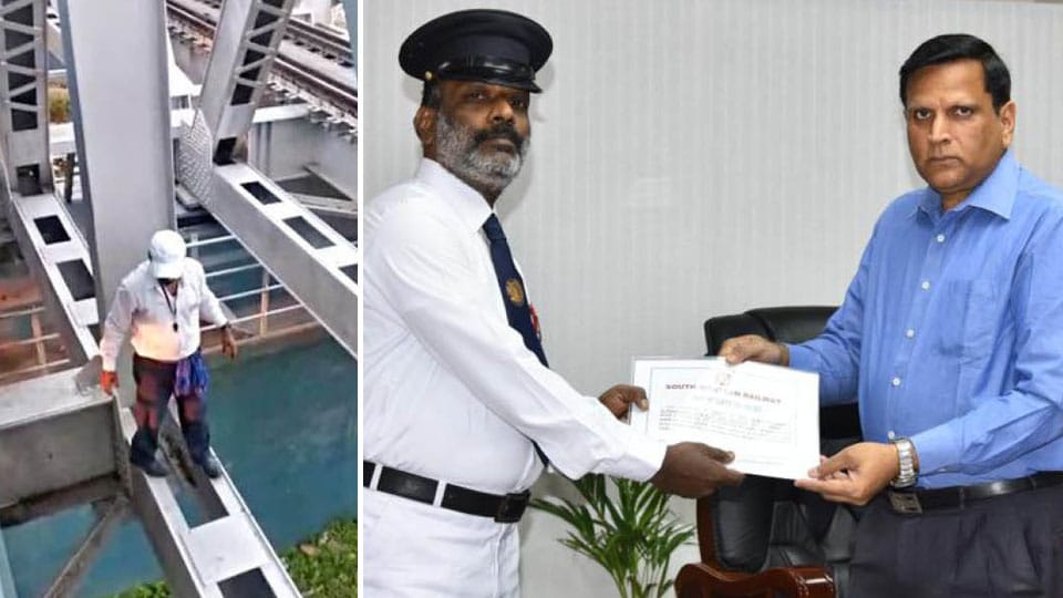 Train guard who risked his life to reset alarm chain felicitated