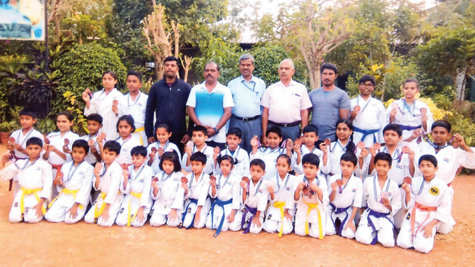 Medal winners at State-level Karate Championships