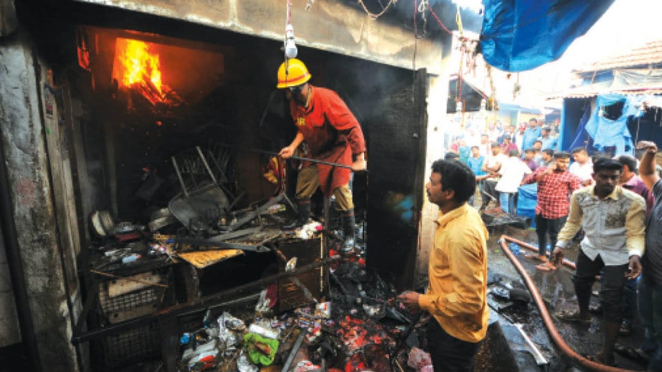 Shop gutted at Devaraja Market
