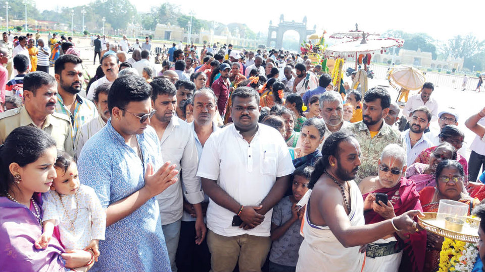 Rathasapthami: Hundreds perform mass 108 Suryanamaskara at Mysore Palace