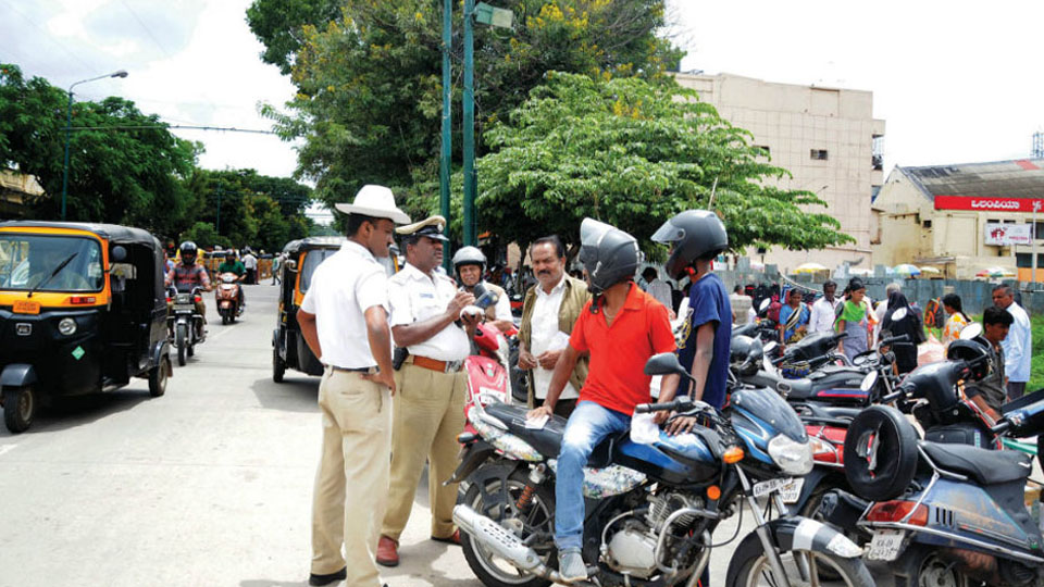 Police conduct drive against drunken-driving, helmetless riding