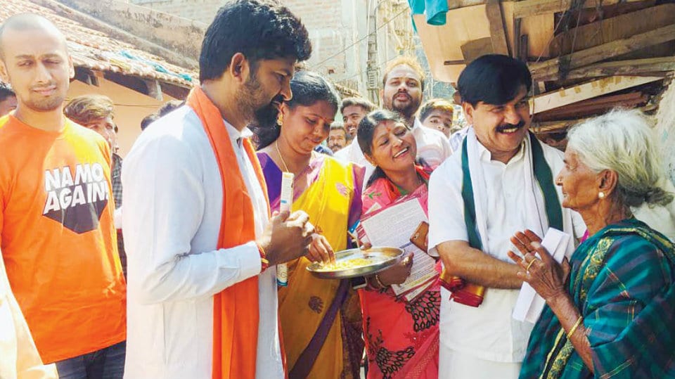 BJP leaders distribute Bevu-Bella