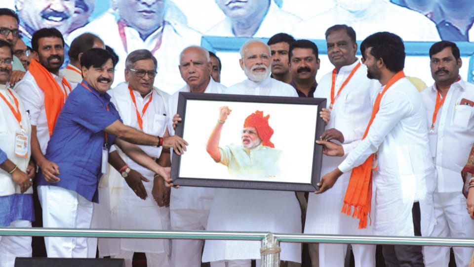 Modi tears into coalition; mocks at Rahul’s Kerala contest