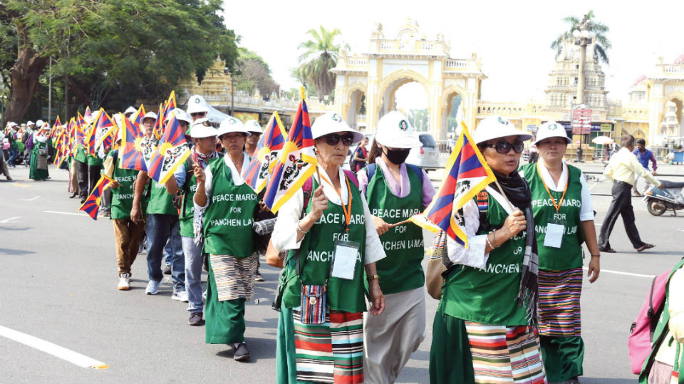 Tibetans hold peace march seeking release of 11th Panchen Lama