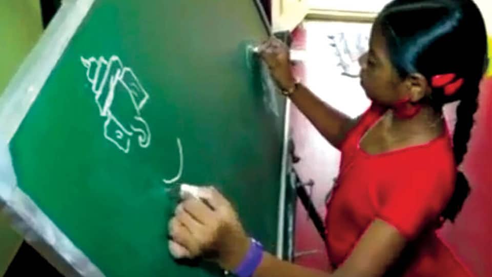 She writes alphabets of 13 languages with both hands simultaneously