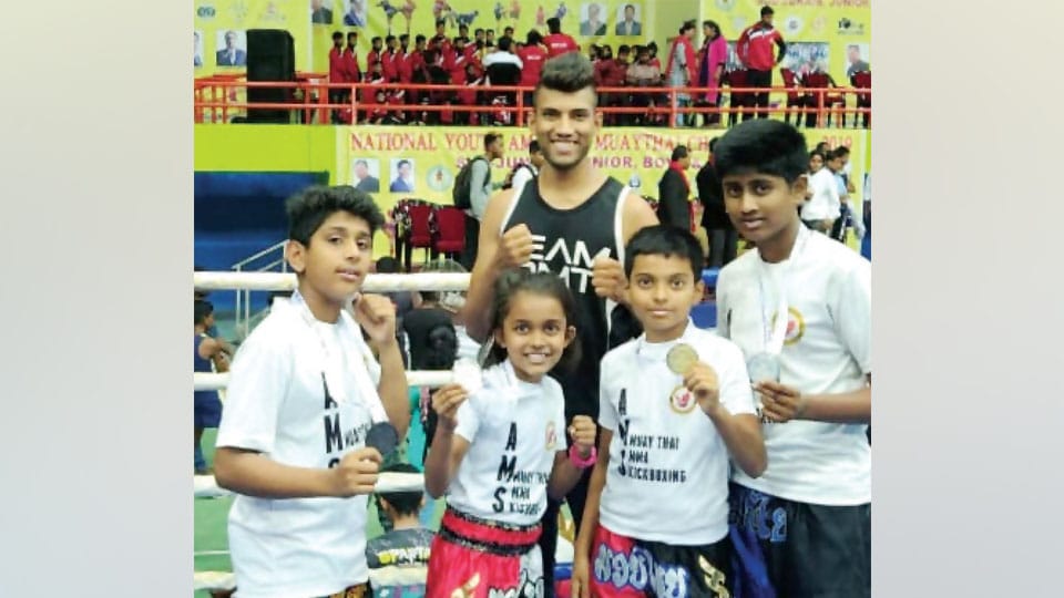 Medal-winning Junior Muaythai Kickboxers