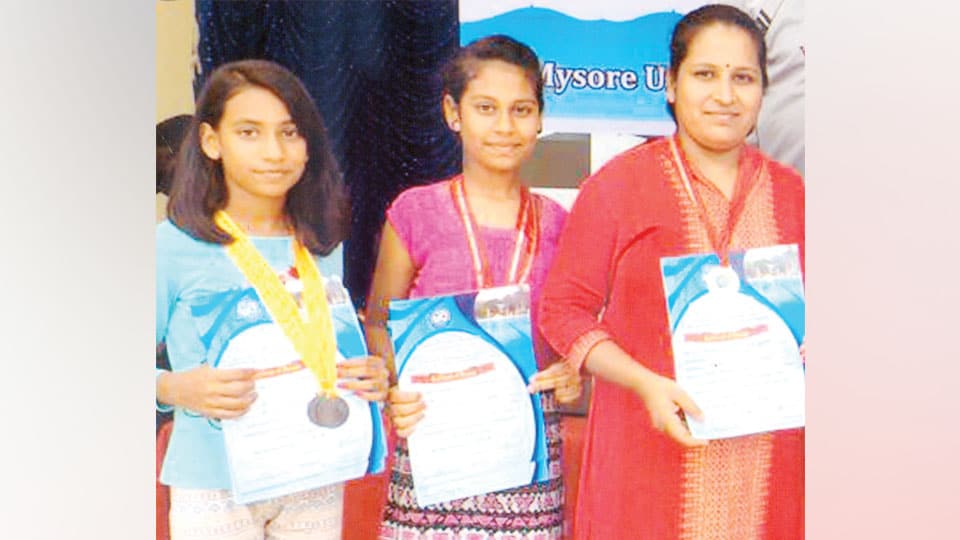 Mother, daughters excel in Swimming