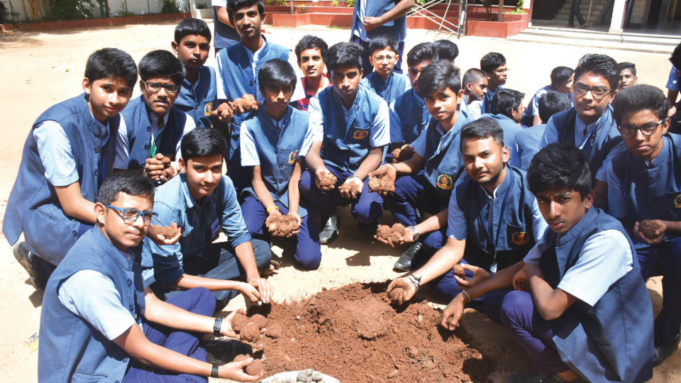 Students learn to prepare Seed Balls at workshop