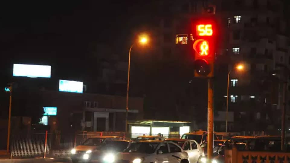 Install traffic signal lights at this junction