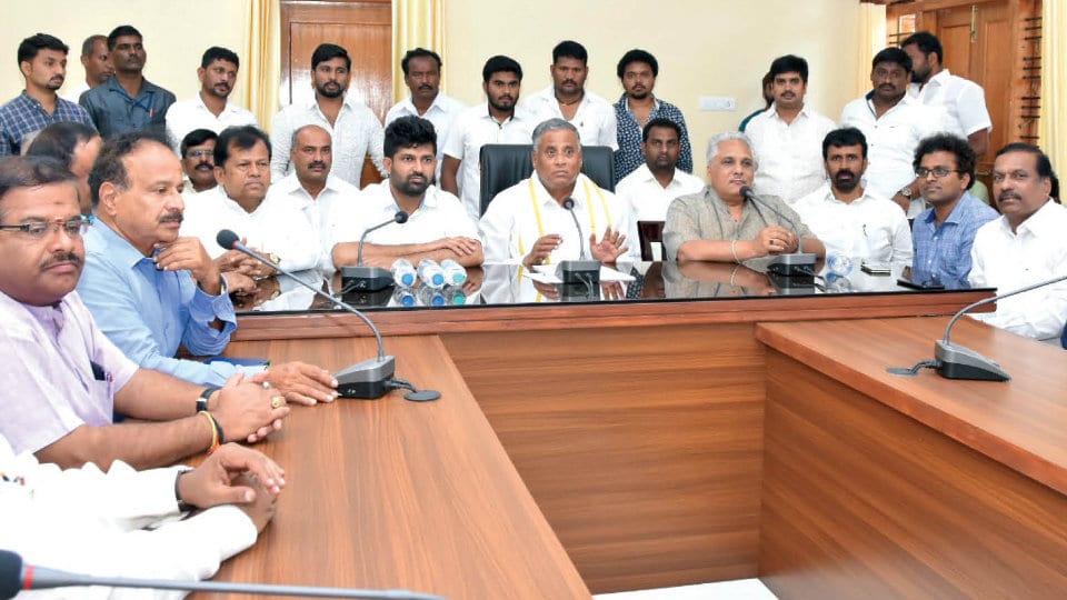 District Minister holds meeting  with BJP party workers on non-official appointments to Dasara Sub-Committees