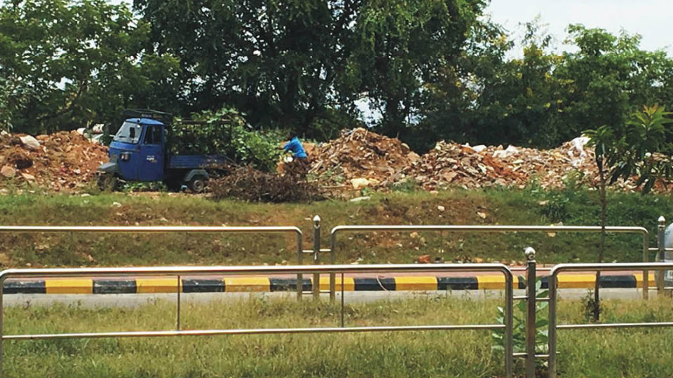 Indiscriminate dumping of construction debris on Vishwamanava Double Road