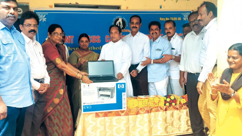 Laptop, printer donated to Government School