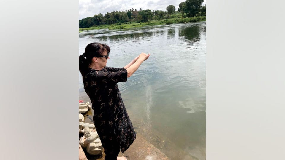 Immersing ashes at Cauvery