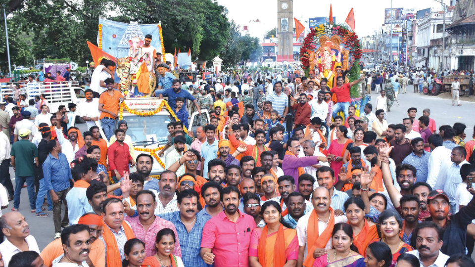 Colourful procession with huge crowds mark mass immersion of Ganesha idols
