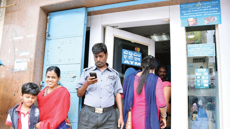 Mobile phone must to withdraw cash from ATM