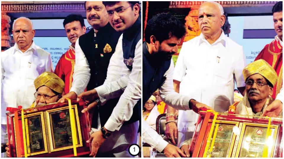CM presents State Rajyotsava Awards