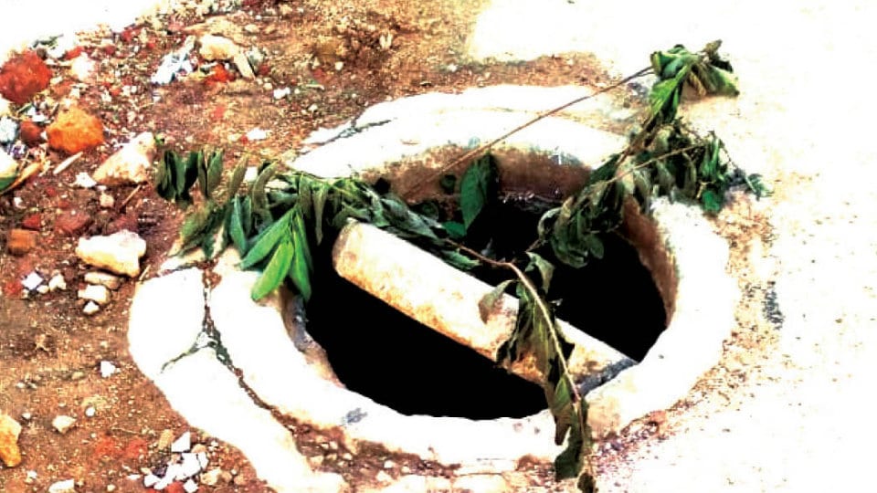 Broken manhole behind Lakshmi Talkies repaired