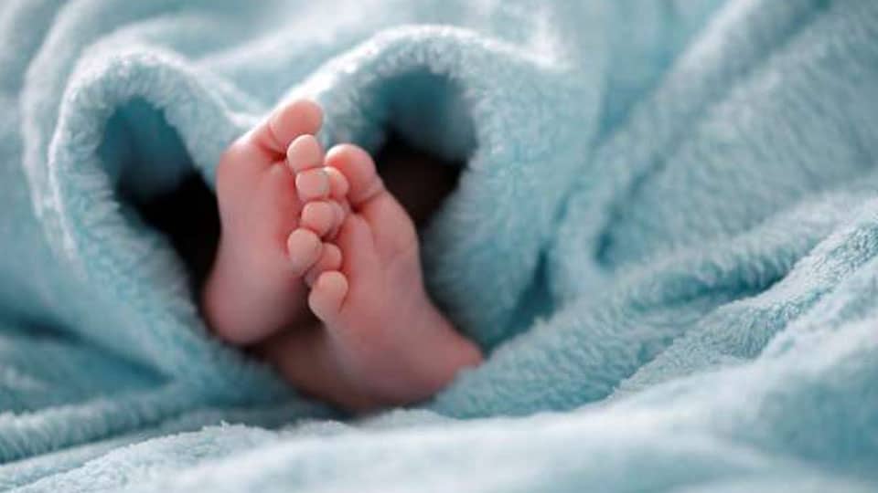 An infant born to minor sold at Madikeri