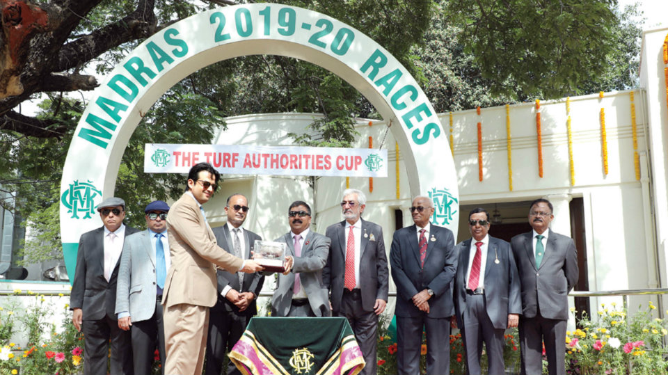 MRC Chairman Dr. Nithyanand Rao presents Cup at Madras Race Club