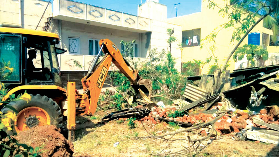 MUDA demolishes unauthorised construction at Gokulam