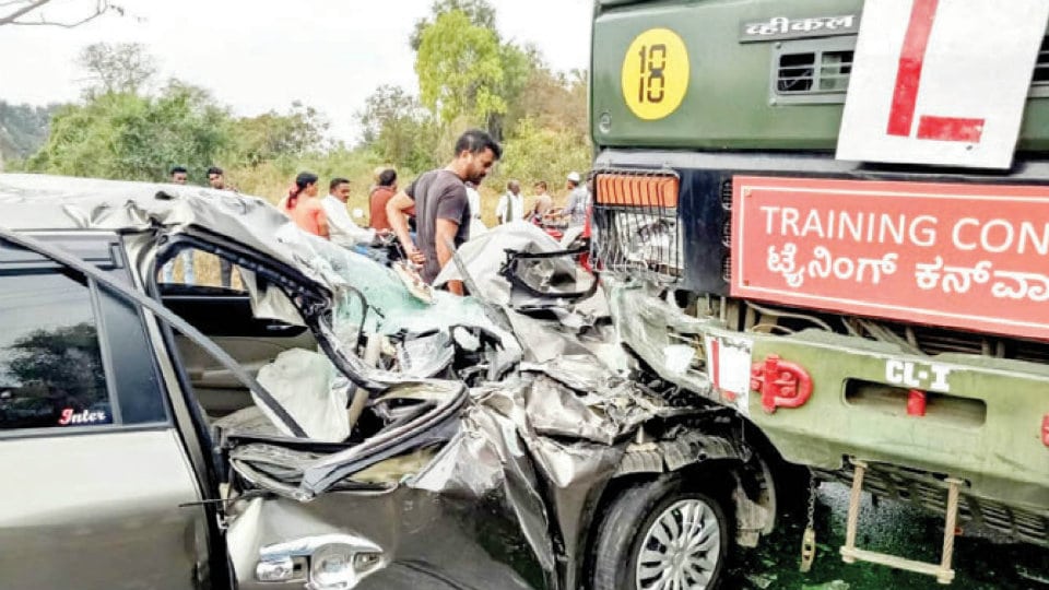 Three injured as car rams into Para-Military training vehicle near Nanjangud