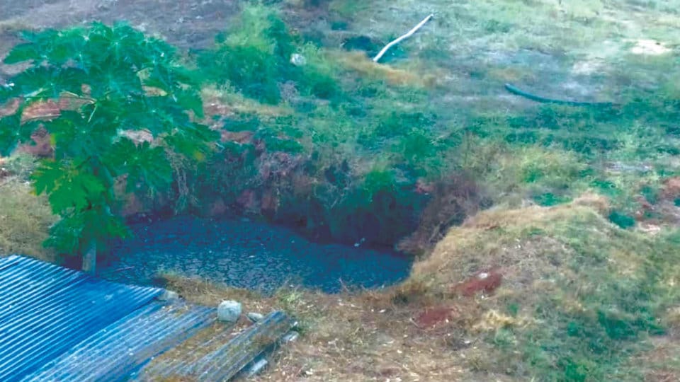 Stinking sewage pit  causing problems at Roopanagar