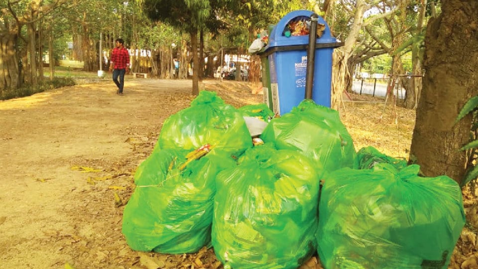 Filled garbage bags not cleared at Kukkarahalli Lake