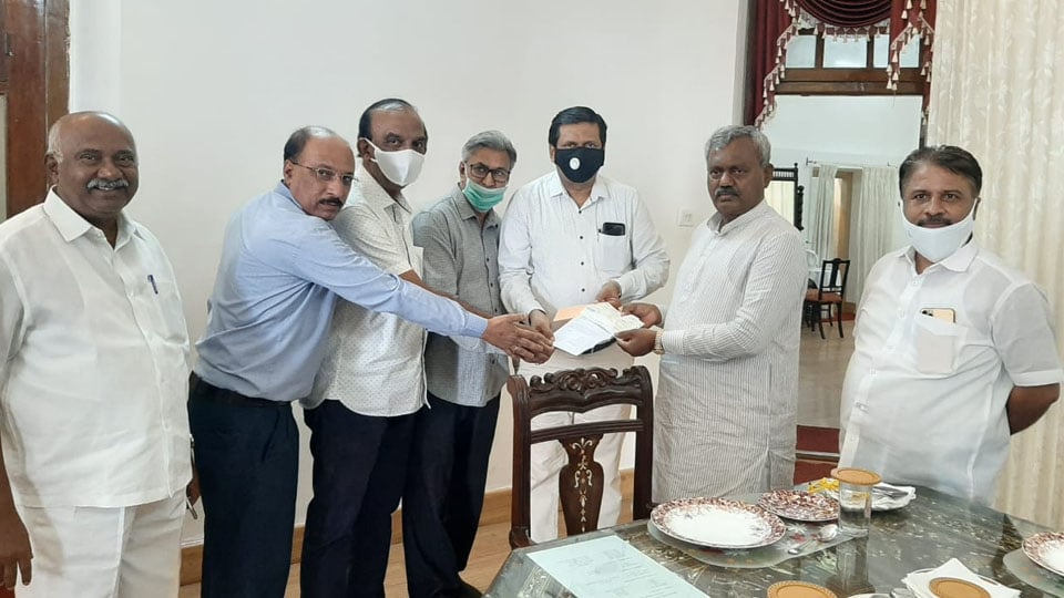 Mysore Merchants Co-op Bank donates Rs. 5 lakh to CM Relief Fund