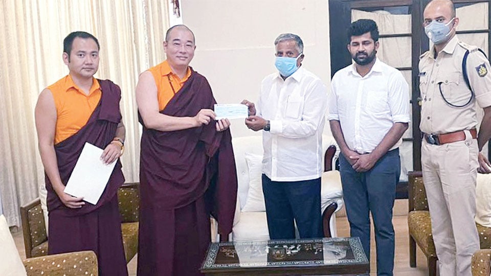 Penor Rinpoche Charity Foundation donates Rs.10,00,000 to CM’s Relief Fund