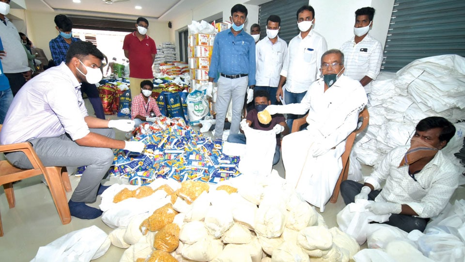 MLA G.T. Devegowda launches distribution of Ration Kits