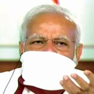 Modi wears home-made face mask, discusses lockdown situation with CMs