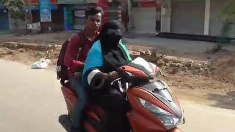 Telangana woman rides 1,400-km to bring back her son stranded in Andhra Pradesh